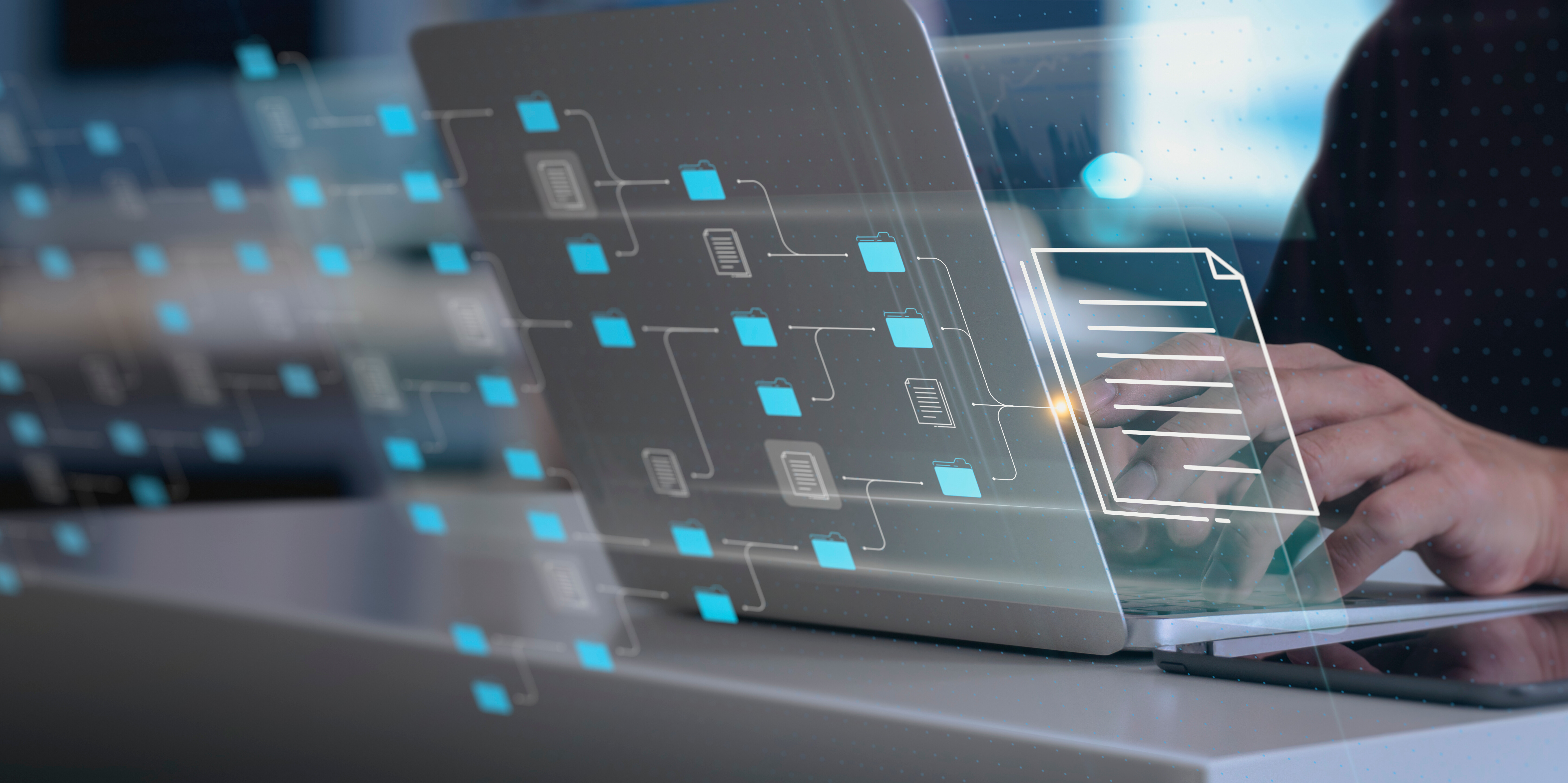 笔记本电脑前的男子与数字数据图标